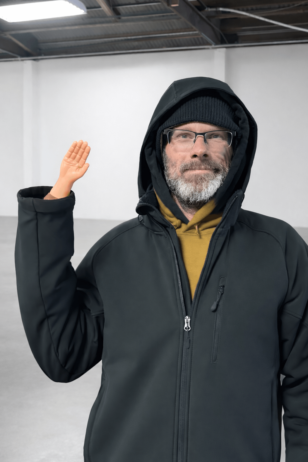 Man holding tiny hand