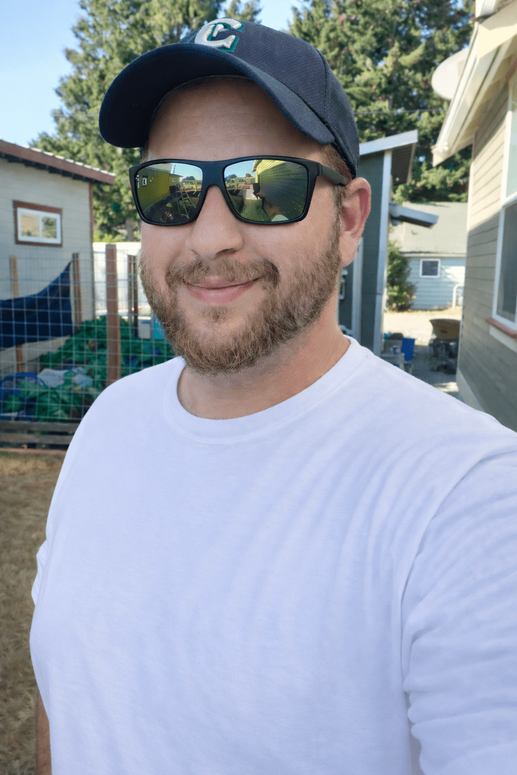 man with a hat and sunglasses