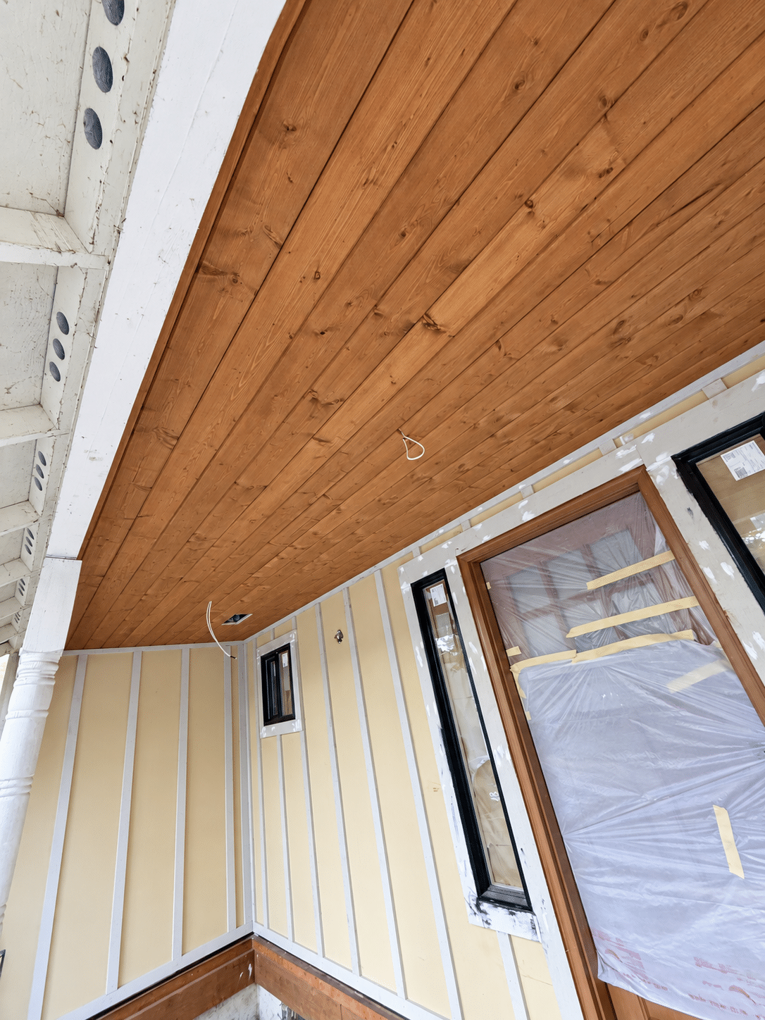 Custom wood porch soffit detail during an exterior remodeling project